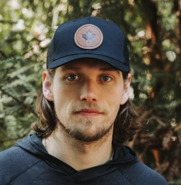 Man wearing blue outdoor cap